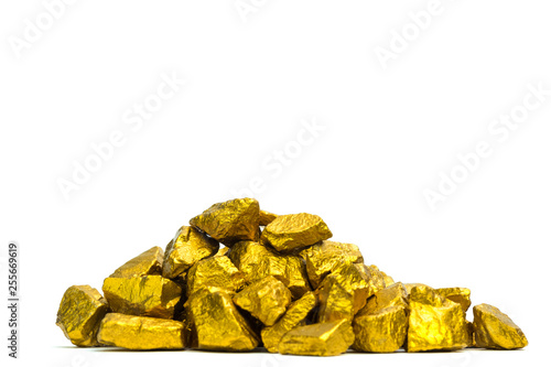 A pile of gold nuggets or gold ore on white background, precious stone or lump of golden stone, financial and business concept.