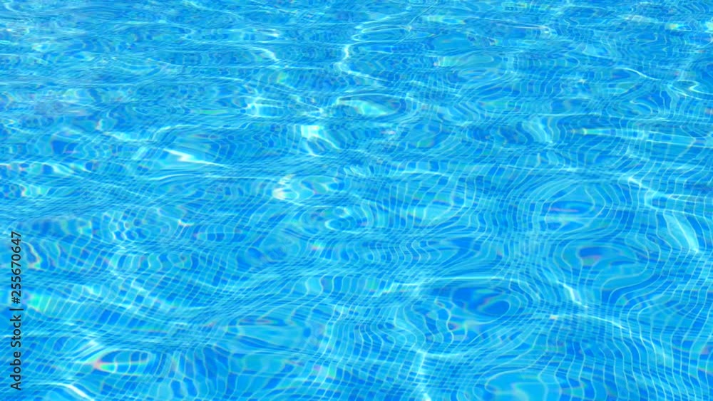 locked shot of full frame clear blue pool water ripples blue mosaic pattern floor on sunny summer daylight situation locked shot of full frame clear blue pool water ripples blue mosaic pattern floor on sunny summer daylight situation