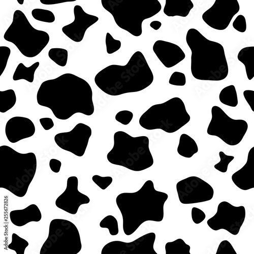 Seamless pattern. Cow or dalmatian. Spots. Black and white. Animal print, texture. Vector background