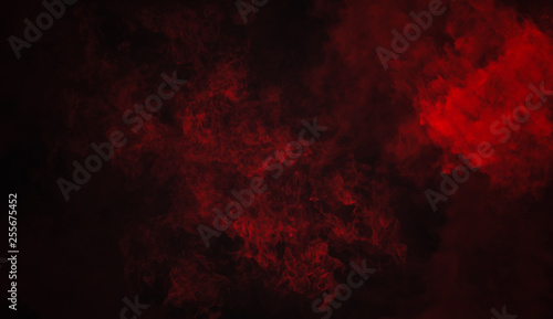 Red fog and mist effect on isolated black background for text or space. Texture smoke