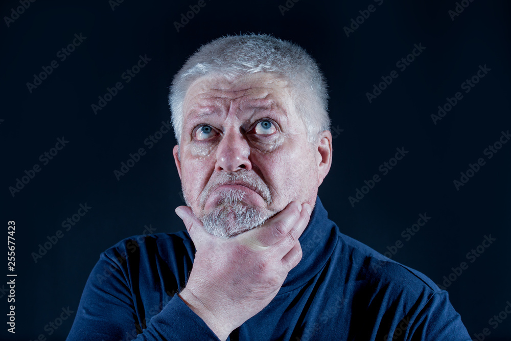 Obraz premium a portrait of a brooding, older man