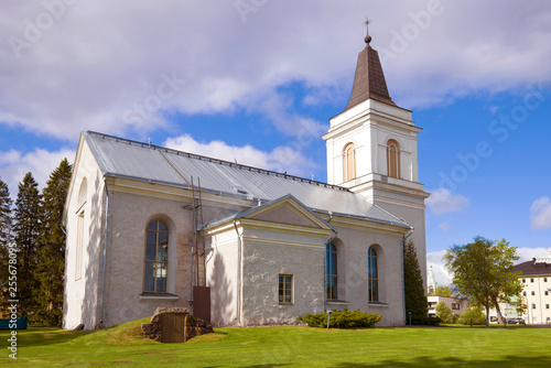 The ancient church of St. Mary (Vehkalahti) on a sunny June day. Hamina, Finland photo