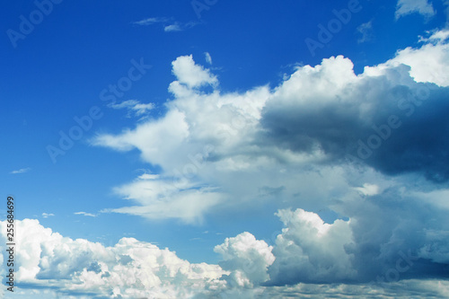 Sky fluffy clouds background. Beautiful sky blue and white