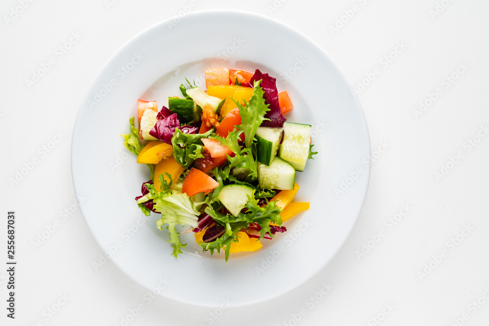 vegetable salad on the white plate vegetable salad on the white plate