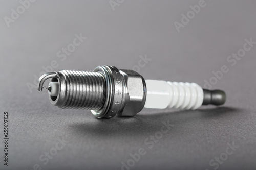 Spark plugs on black background