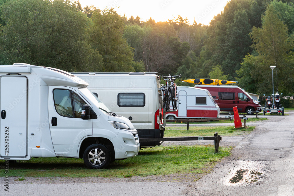 Camper vans in a camping park Camper vans in a camping park