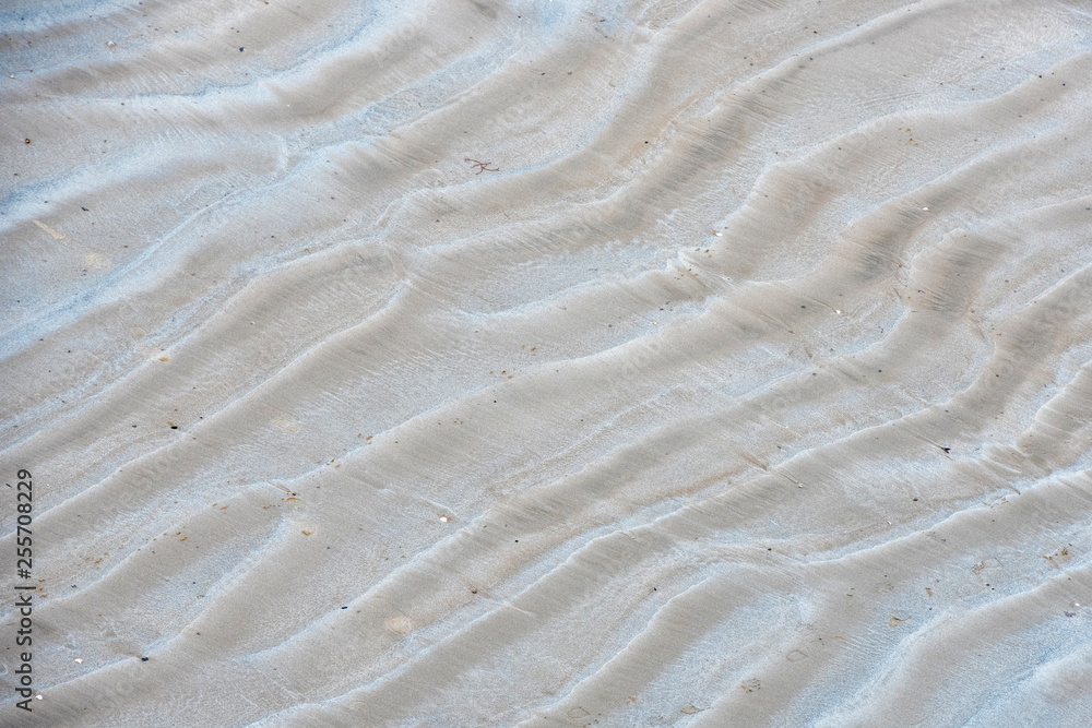 waves in the beach sand waves in the beach sand