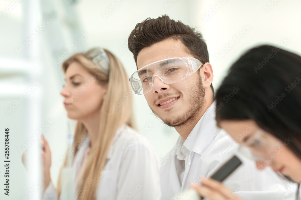 close up.a group of young scientists in the laboratory close up.a group of young scientists in the laboratory