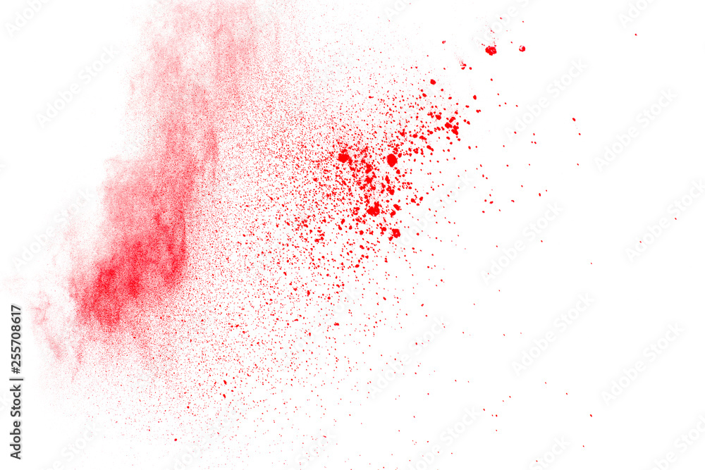 Abstract red dust explosion on white background. Freeze motion of red powder splash. Abstract red dust explosion on white background. Freeze motion of red powder splash.