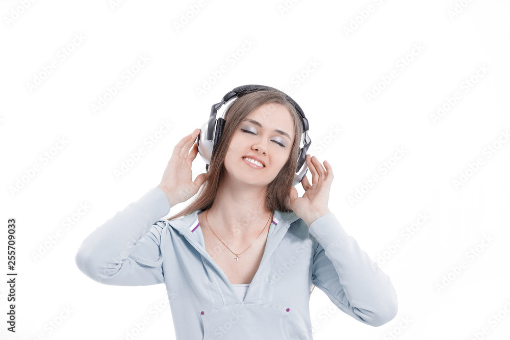 closeup. modern young woman in headphones . isolated on a white closeup. modern young woman in headphones . isolated on a white