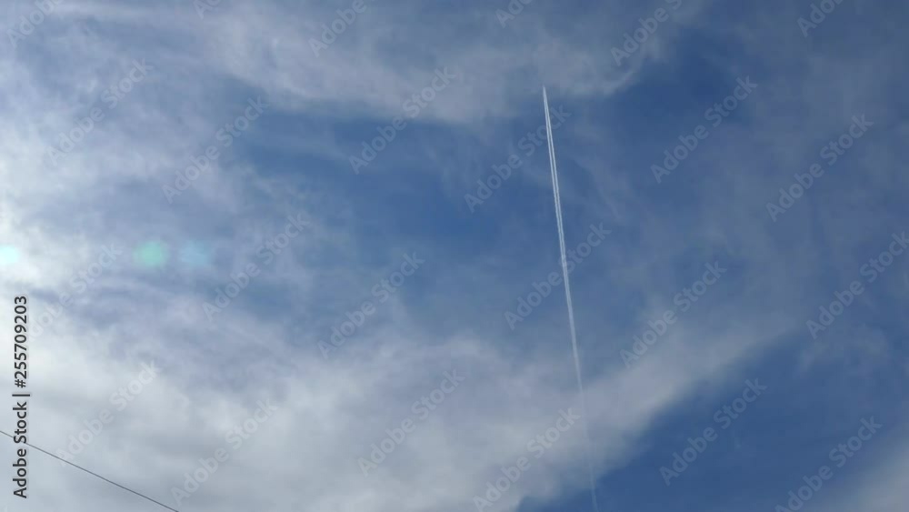a passenger plane flying through the clouds, a passenger plane entering the clouds, a passenger plane flying through the clouds, a passenger plane entering the clouds,