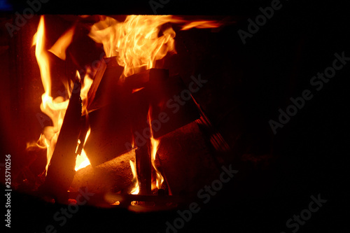fire in the fireplace. concept of home comfort and warm atmosphere. cozy home