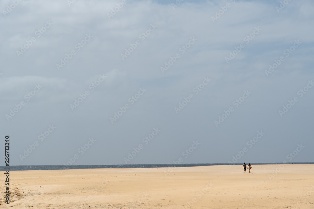 minimalistic beach scene with two persons 