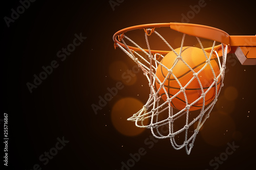 3d rendering of a basketball in the net on a dark background.