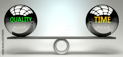 Fotografie Quality and time balance, harmony and relation pictured as two equal balls with