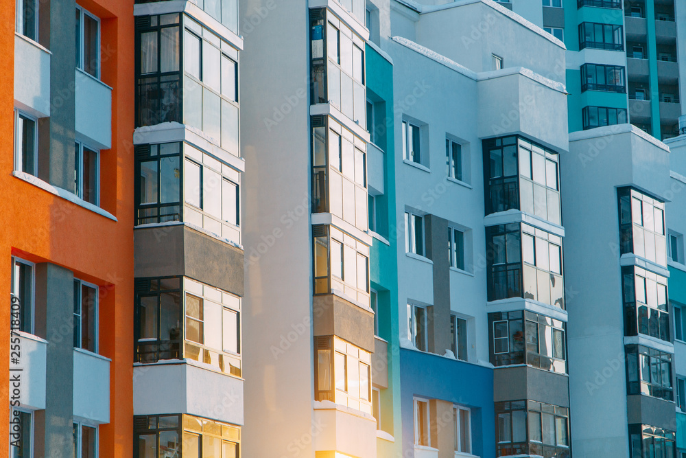 Parts of the facades of modern houses. Bright juicy colors in the construction of buildings.