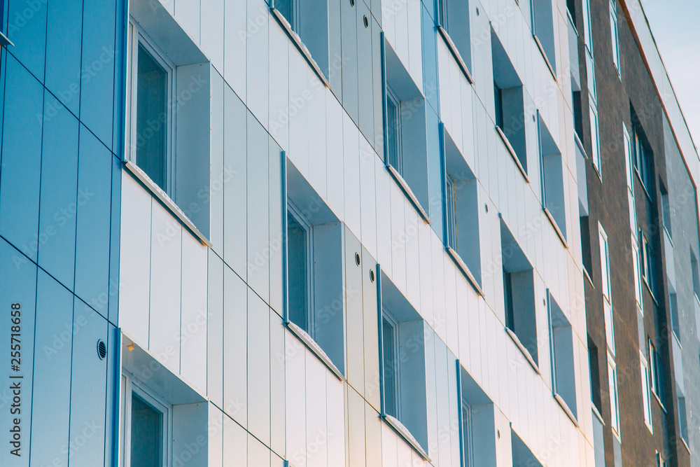 Parts of the facades of modern houses. Bright juicy colors in the construction of buildings.