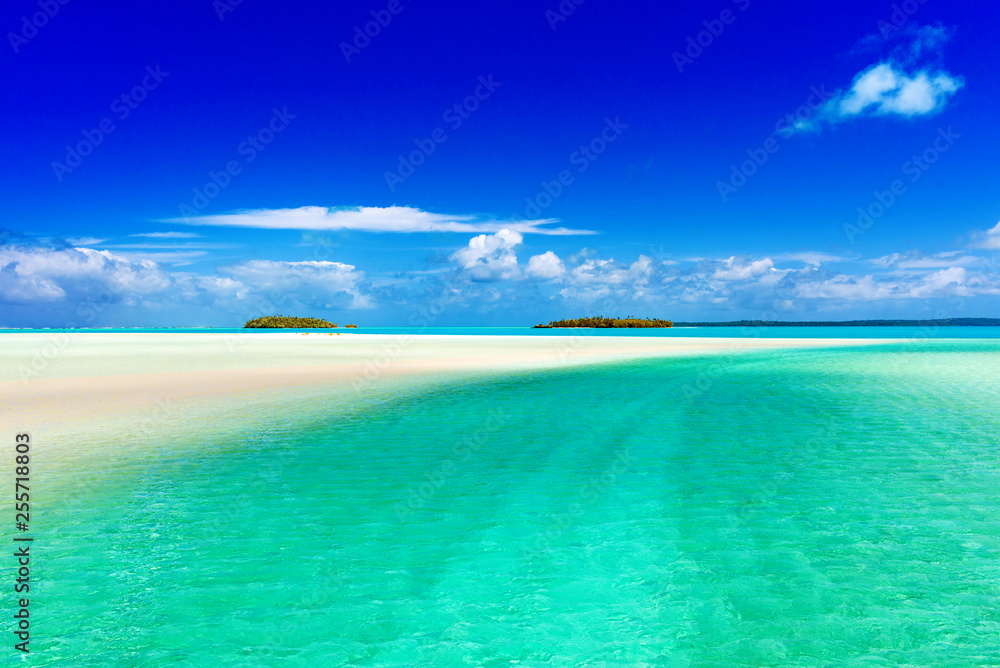 Sandbank with turquoise water and blue sky, Aitutaki island, Cook Islands, South Pacific. Copy space for text.