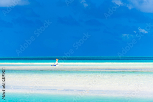 View of the Sand Bank with turquoise calm Ocean , Aitutaki island, Cook Islands, South Pacific. Copy space for text.