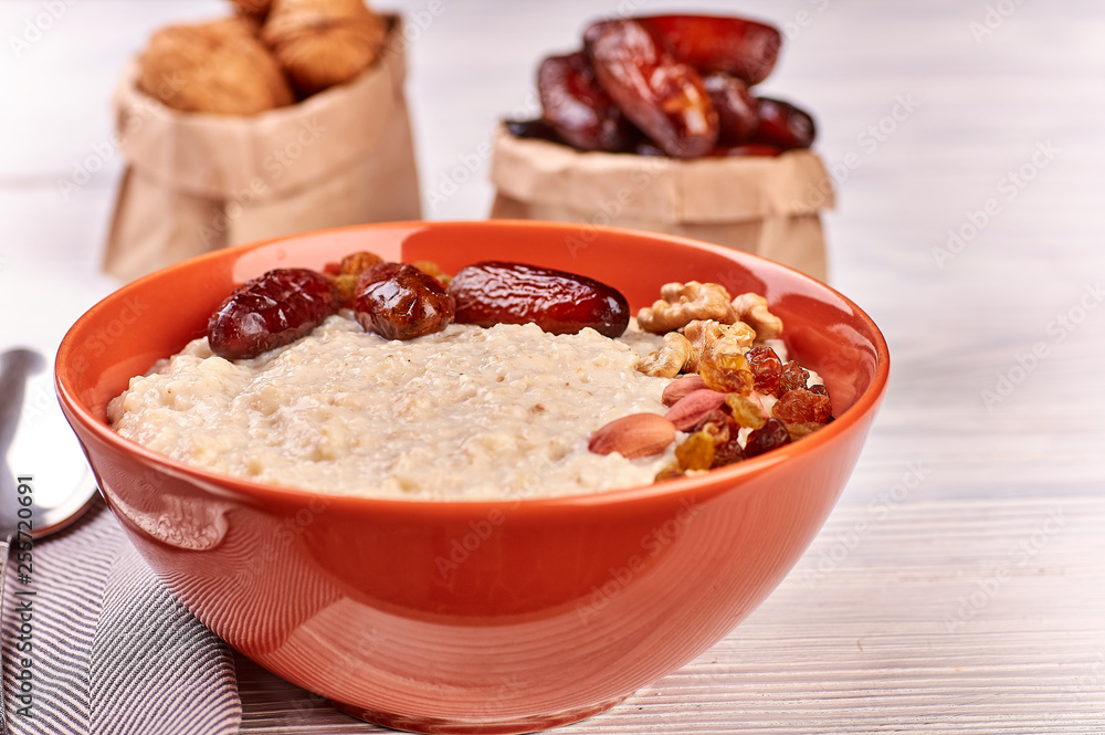 porridge with fruit on wooden background porridge with fruit on wooden background