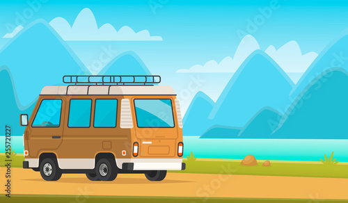 Camping. Minivan on a background of mountain scenery and the lake. A trip to nature