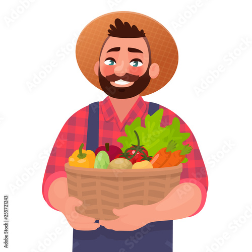 Happy male farmer holding a basket with vegetables. Useful and tasty rustic foods. Design element of a private farm