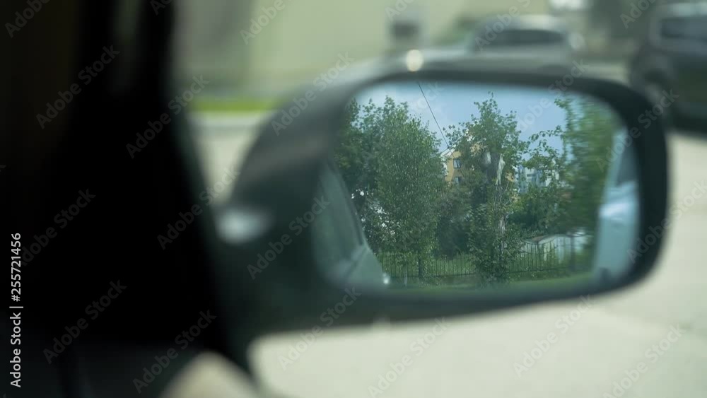 View in the rear view mirror in the car. Close up. View in the rear view mirror in the car. Close up.