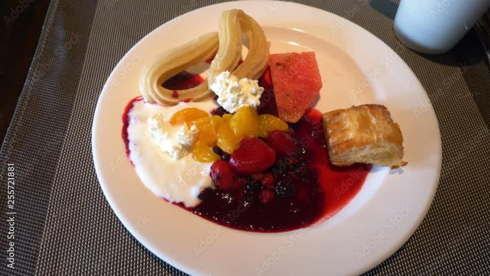 Plate of spanish dessert in 4k slow motion 60fps Plate of spanish dessert in 4k slow motion 60fps
