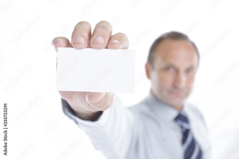 blurred image. businessman showing a blank business card blurred image. businessman showing a blank business card