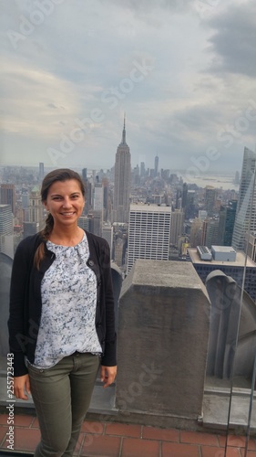 hot sexy breathtaking woman on top of rockefeller center new york