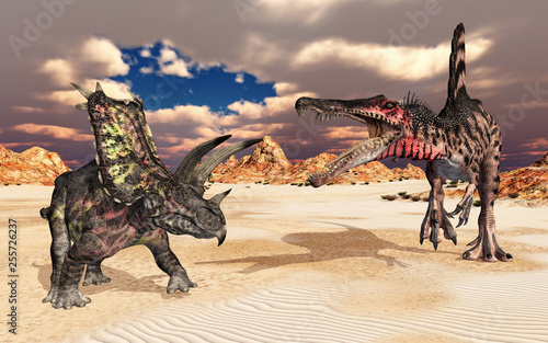 Die Dinosaurier Pentaceratops und Spinosaurus in einer Landschaft photo