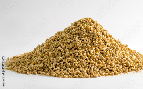 Animal feed for chicken and pig closeup with white background. Photo for feeding business and pet photo