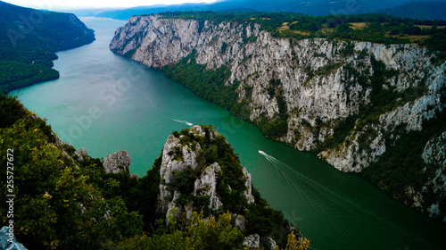 Fototapeta Naklejka Na Ścianę i Meble -  The iron gate of the Donau/danube river forms the natural border between Serbia and Romania. The Serbian side is the Djerdap national park (Djerdapska klisura). This is the smallest point of the river