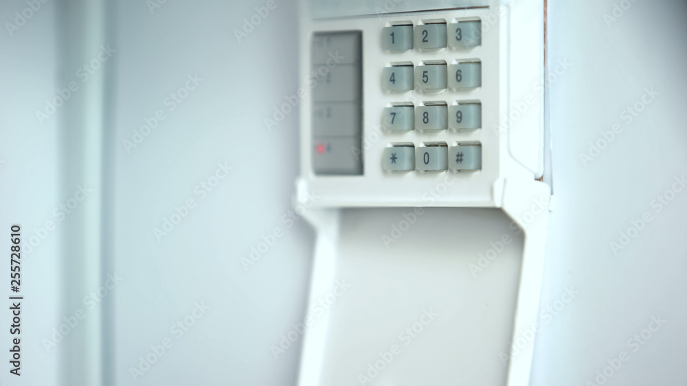 Home alarm system white wall, private property protection, surveillance system Home alarm system white wall, private property protection, surveillance system