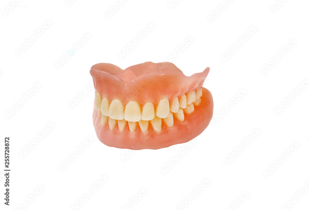 Complete full dentures isolated on white background Complete full dentures isolated on white background
