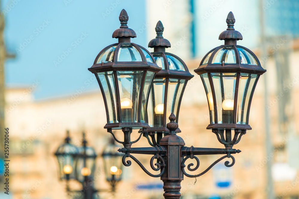 Closeup of vintage metal lantern in the city