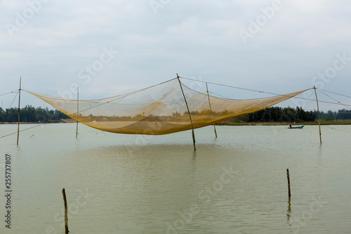 Large square-shaped fishing net over water off Cam Nam, Hoi An, central Vietnam