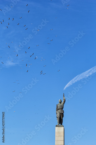 Monument to Alyosha in Burgas meets storks photo