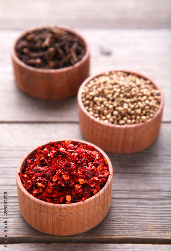 Spices mix on a grey wooden background. Top view Spices mix on a grey wooden background. Top view