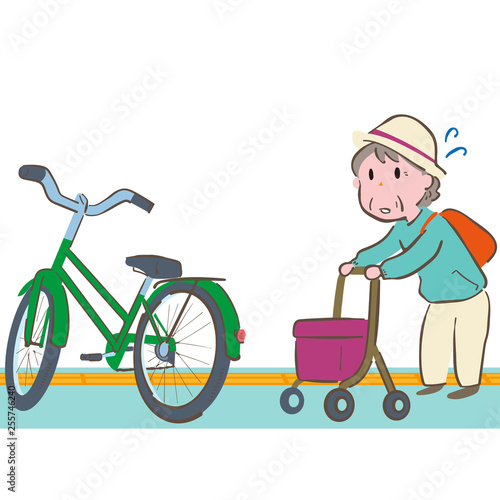 シルバーカーを押すおばあちゃんが自転車が障害になって進めず困っているイラスト