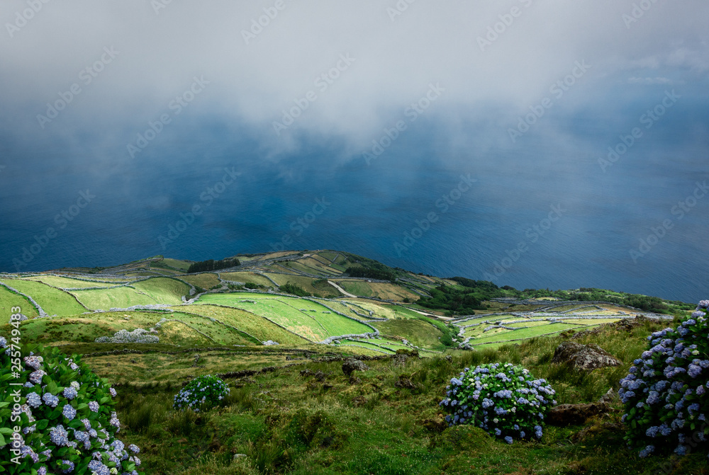 Fototapeta premium Portugal, the Azores. View on the eastside of Corvo island and the atlantic ocean.