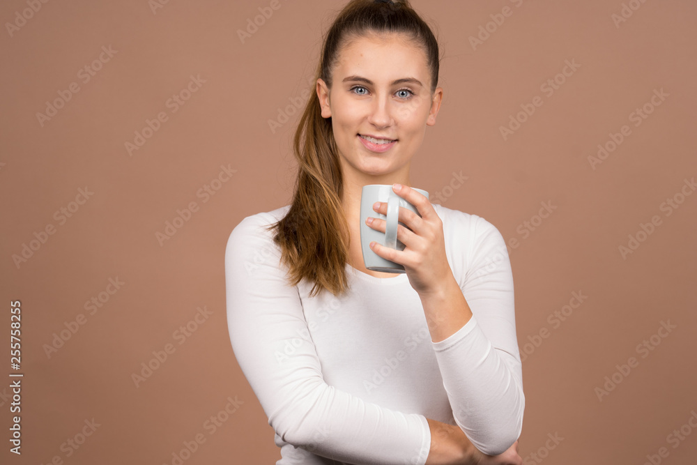 girl with a cup of tea and coffee