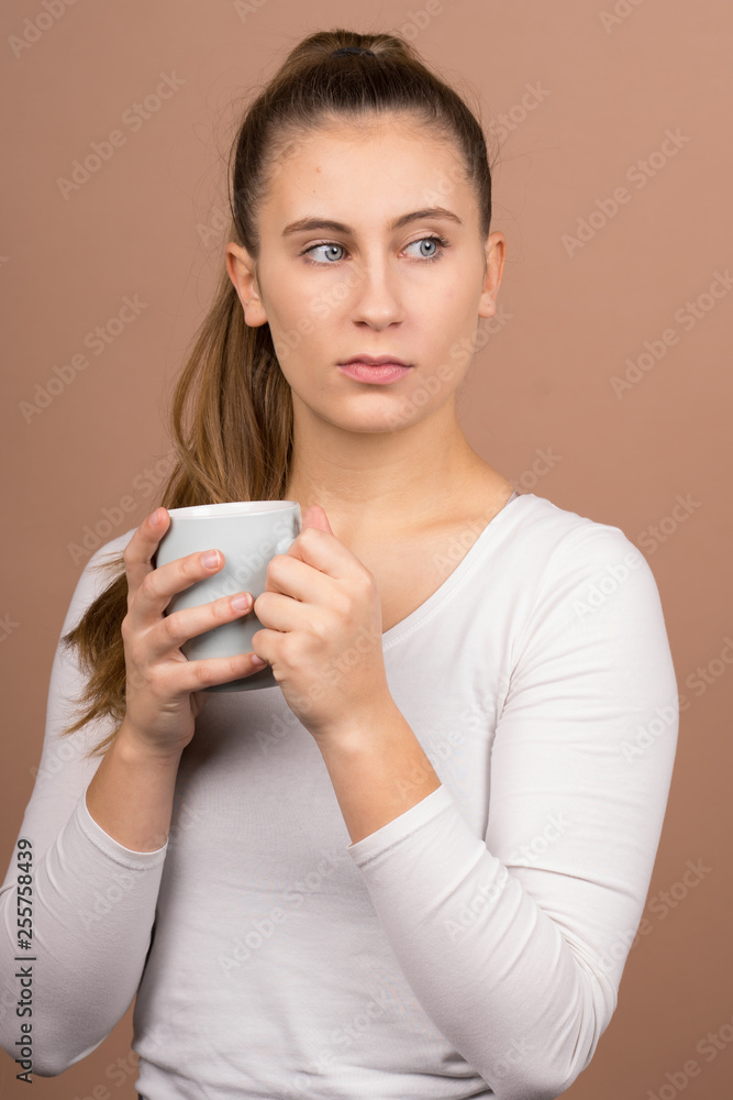 girl with a cup of tea and coffee girl with a cup of tea and coffee