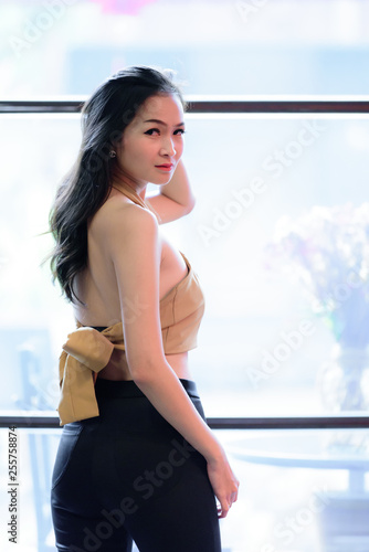 Free Download Asian pretty and sexy portrait girl has relaxing at coffee cafe restaurant in the morning. - GFXLoad