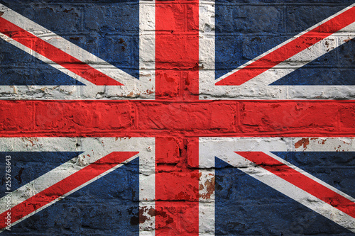 British flag on brick wall background.