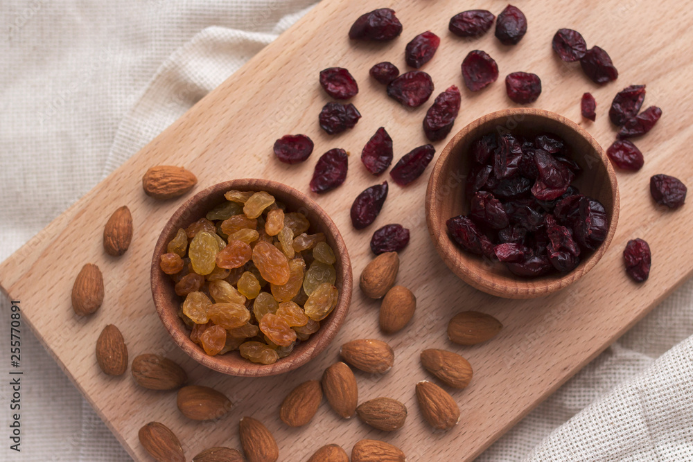 dried fruits in wooden spoons dried fruits in wooden spoons