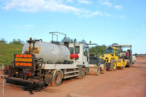 Truck and roller on a construction site