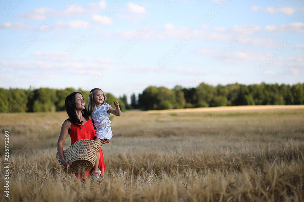 Summer landscape and a girl on nature walk in the countryside. Summer landscape and a girl on nature walk in the countryside.