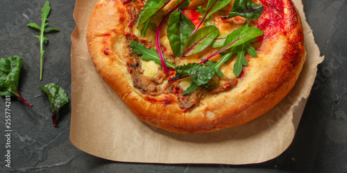 pizza, mushrooms, chicken, tomato sauce, cheese, (pizza ingredients and microgreen). hot pizza. Top view. copy space