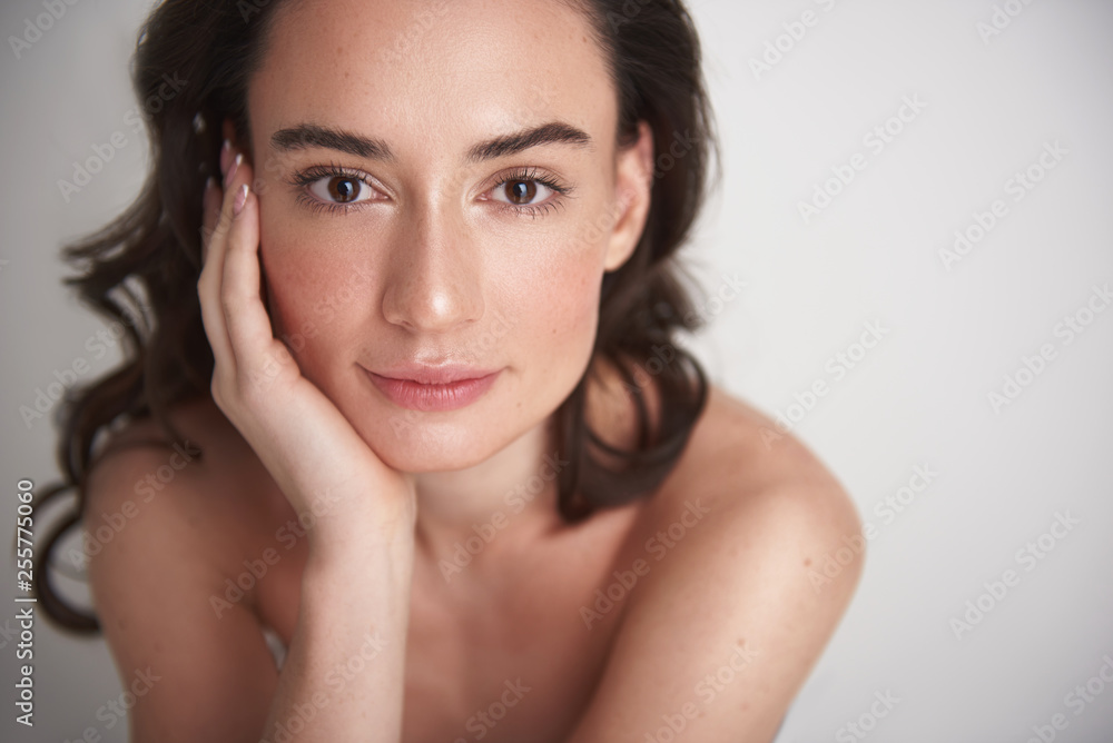 Portrait of young pretty brunette woman on white Portrait of young pretty brunette woman on white